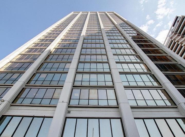 Oficina Desarrollada en 2 Plantas con Una Superficie Total de 1470 m², con 13 Cocheras y 9 Bauleras - 4