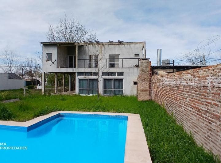 Casa 3 Dorm. con Jardín y Piscina - Tierra de Sueños 3 - Roldan | Venta - 5