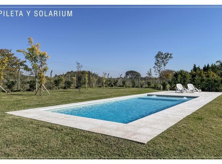 Oportunidad Única en Chacras de La Reserva: Diseño, Naturaleza y Confort Familiar (Apta Credito) - 3
