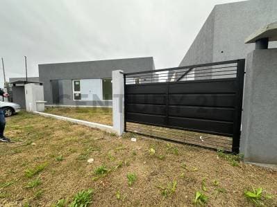 CASA 2 DORMITORIOS A ESTRENAR EN VILLA ELISA - Principal