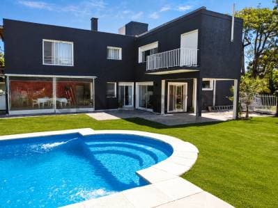 Imponente casa sobre dos lotes en Maschwitz Country Club- acepta permuta - Principal