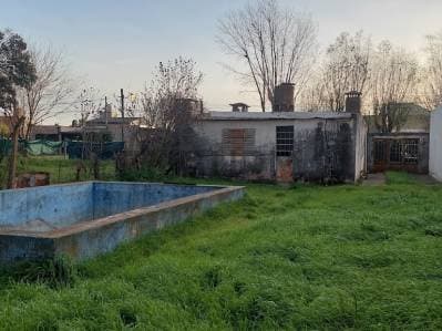 VENTA TERRENO 500 M2, CON VIVIENDA A RECICLAR, PILETA, EL CARAMELO, ROSARIO - Principal
