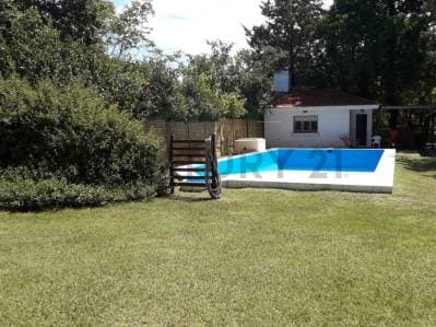 VENTA LOTE CON PISCINA Y MEJORAS EN FUNES - Principal