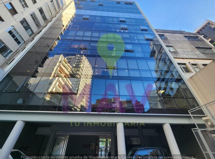 Venta con o Sin Renta de Oficina Equipada con Cochera Cubierta en P. B. en Edifico Corporativo Aaa. - 4